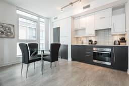 Executive Downtown 1BR | Dedicated Workspace