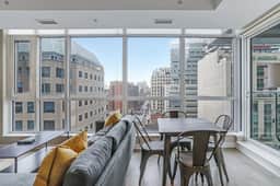 High-Floor Downtown 1BR+Den | City Views