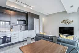 High-Floor Downtown 1BR+Den | City Views