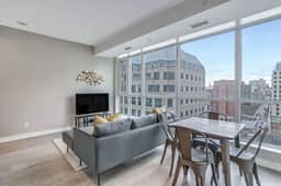 High-Floor Downtown 1BR+Den | City Views