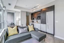 High-Floor Downtown 1BR+Den | City Views