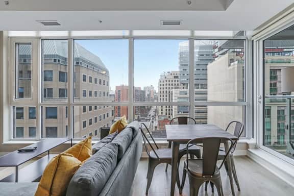High-Floor Downtown 1BR+Den | City Views