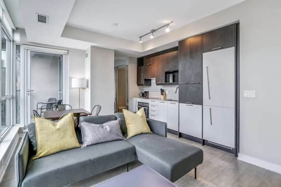 High-Floor Downtown 1BR+Den | City Views